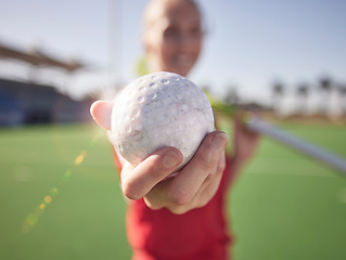 Image showing Sport, ball in hand and hockey on field with athlete and fitness outdoor for training on stadium turf. Hockey player, workout and sports closeup, field hockey and active with healthy lifestyle.