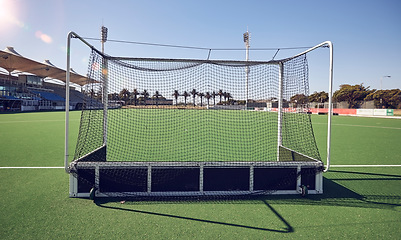 Image showing Field turf, hockey goals and sports stadium for fitness contest, training game or outdoor competition exercise. Green pitch, astroturf grass and field hockey arena for health workout, match and score
