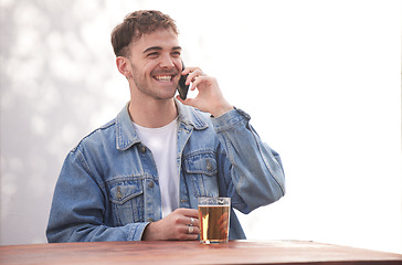 Image showing Beer, alcohol and phone call communication for man talking, discussion and speaking to 5g mobile contact. Conversation, shop service and happy gen z person relax with glass drink at outdoor pub table