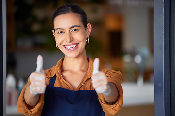 Image showing Thumbs up, small business and shop, cafe or restaurant owner feeling happy, pride and ready for service at door of her store. Portrait of happy entrepreneur with hand sign for goal or success to open