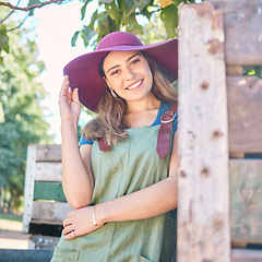 Image showing Countryside, farming trees and farmer woman for agriculture, sustainability and summer harvest lifestyle with portrait. Supplier, seller or business owner with fruit tree for food production industry