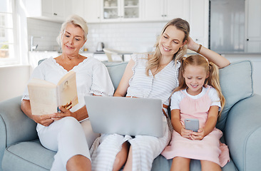 Image showing Laptop, phone or book with grandmother on sofa enjoying reading leisure with family in cozy home. Relax, family home and living room activity in Australia with happy grandma, mom and child.