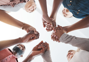 Image showing Diversity, support and people holding hands in trust and unity for community in the outdoors. Hand of diverse group in solidarity for united team building, collaboration and teamwork success together