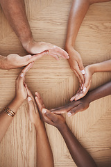 Image showing Diversity, teamwork and creative hands in synergy of employee workers together in collaboration at work. Table group of people hand in circle unity for agreement, help and team for community