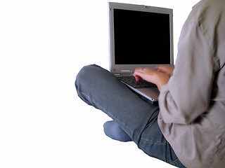 Image showing Girl typing on a laptop