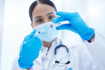 Image showing Covid, vaccine or insulin in hands of doctor with face mask in hospital or clinic. Healthcare, medical insurance and vaccination innovation, woman in medicine and protection against virus infection.