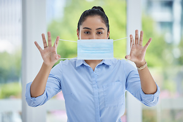 Image showing Covid, face mask and business woman at the office, health and safety in the workplace. Young, corporate person in portrait and compliance of healthcare, rules and regulations policy of virus.