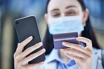 Image showing Covid, phone and credit card with a woman customer online shopping using 5g mobile technology closeup. Finance, accounting and fintech with a female consumer spending money on the internet from below