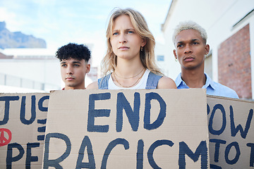 Image showing Racism protest, sign and people in support of human rights, equality and justice together in the city. Group of angry, frustrated and focus adults with poster for freedom during a revolution in usa