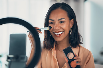 Image showing Beauty influencer, vlogger or podcast host teaching with a phone to film live stream makeup tutorial with blush makeup brush and palette. Happy woman use technology to promote cosmetic product online