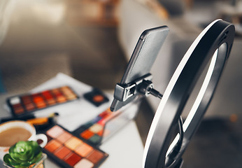 Image showing Beauty blog, cosmetics and phone stand of a social media makeup vlogger ready for shooting a video. View of influencer equipment and products ready for live streaming a tutorial for web content