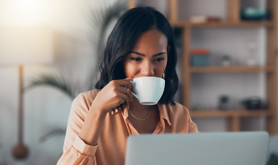 Image showing Thinking, planning and working from home on laptop while entrepreneur drinks coffee, tea or hot drink to help concentrate. Freelance blogger or writer with vision ideas, strategy and blog innovation