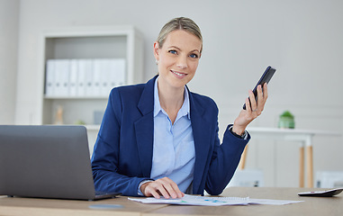 Image showing Business woman, accounting executive and finance manager planning on phone while reading data, strategy and paperwork for report in an office. Portrait of a leader, analyst and worker with analytics