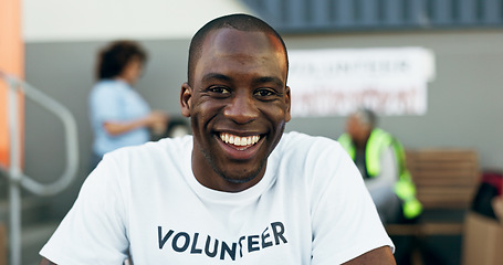 Image showing Man, volunteer and smile in portrait, charity and outreach program for society in outdoors. Happy black person, nonprofit and support in social responsibility, NGO foundation and community service