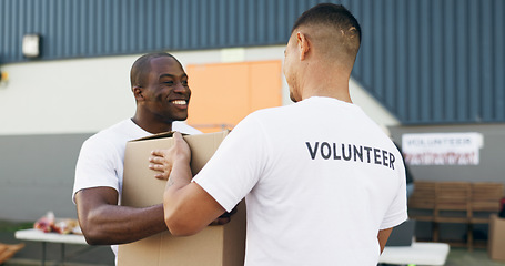 Image showing Volunteer men, helping and boxes for charity, food and clothes drive with community service for kindness. Teamwork, support and social responsibility for donation package, smile and care in workshop