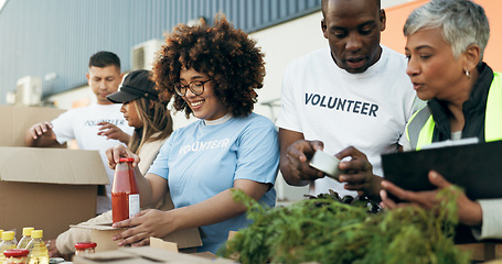 Image showing Group of people, volunteer and checking food boxes on table for charity with care, kindness and help. Community donation, happy men and women at ngo with grocery checklist at non profit project event