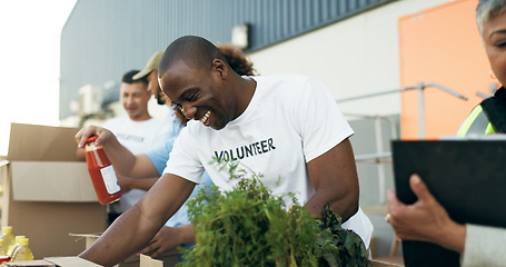 Image showing Volunteer, men and women with food boxes on table for charity event with care, kindness and smile. Community donation, help and team at ngo with grocery package distribution at non profit project.