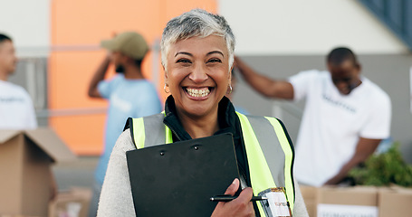 Image showing Woman, clipboard and donation for charity, volunteer and organizer for outreach program, smile and portrait. Happy senior person, non profit and support in social responsibility for NGO foundation