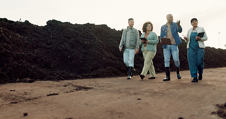 Image showing Team, farmer and agriculture or business walking on dirt land or collaboration, compost or environment growth. Man, woman or planning field inspection management, fertilizer or gardening paperwork