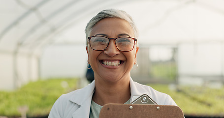 Image showing Portrait, botanist and happy woman at greenhouse for science at farm, plant and checklist for ecology. Face, smile and mature scientist at nursery for agriculture in glasses for research in Mexico