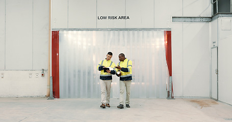 Image showing Engineering, tablet and communication in warehouse for teamwork, collaboration on construction floor plan. Diversity, professional men or people for building design, factory and project management