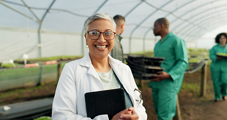 Image showing Portrait, botanist and happy woman at greenhouse with tablet tech for science at farm, plant and ecology. Face, smile and mature scientist at nursery for agriculture in glasses for research in Mexico