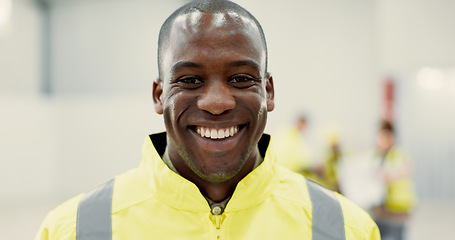 Image showing Smile, happy and portrait of black man construction worker standing with confidence in a warehouse. Positive, pride and young African industrial employee at an indoor site for maintenance or repairs.