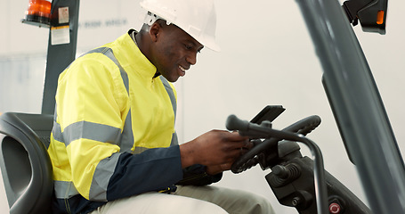 Image showing Construction site, tablet and black man in forklift machine for maintenance, planning and renovation. Engineering, architecture and contractor on digital tech for online design, building and report