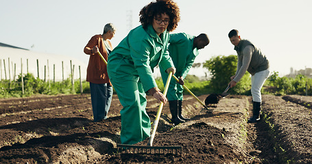 Image showing Woman, farmer and rake land, grow healthy food and sustainability for eco friendly agriculture. Brazil person, work and nature for green organic industry in ecology, health soil and field for plants