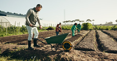 Image showing Man, farming and wheelbarrow on land, healthy food and sustainability in eco friendly agriculture. Diversity, work and africa compost in ngo farm startup in ecology, health soil and field to plant