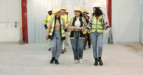 Image showing Engineering group, manager walking and warehouse inspection, teamwork and talking of project management. Industrial people, leader or women with discussion for architecture or construction building