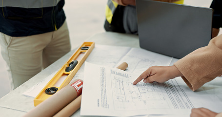 Image showing People, engineer and hands with blueprint in planning, construction or brainstorming ideas on table at site. Closeup of contract group, architect or builders with floor plan or documents on desk