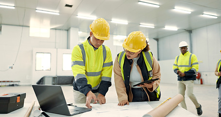 Image showing Engineering people, blueprint and technology for construction site planning and building design in warehouse. Industrial worker and manager with tablet, laptop or teamwork for architecture floor plan