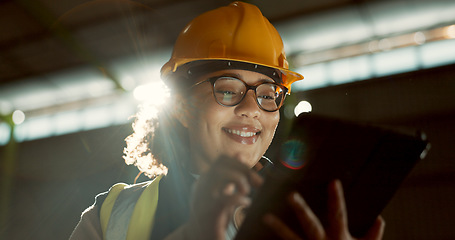 Image showing Happy woman, engineer and tablet in warehouse for inspection, inventory or storage. Face of female person, architect or contractor smile on technology for quality control, communication or management