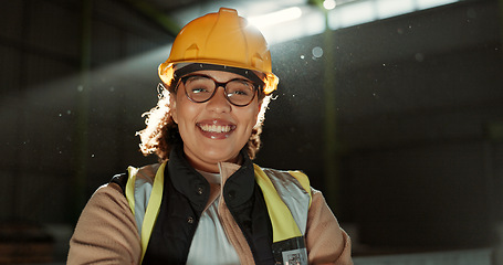 Image showing Happy woman, portrait and professional engineer in warehouse for maintenance or construction. Face of female person, architect or contractor smile in safety helmet for industrial building management