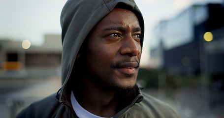 Image showing Fitness, face and thinking, black man in city on rest from morning workout in hoodie. Relax, breathing and tired African athlete on calm urban exercise with fatigue, reflection and outdoor fresh air.