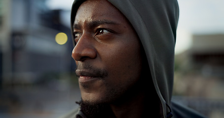 Image showing Morning exercise, face and thinking, black man in city on rest from wellness workout in hoodie. Relax, breathing and African athlete on calm urban fitness with fatigue, reflection and outdoor air.