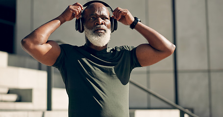 Image showing Fitness, music headphones and black man on stairs in city, workout and exercise for body health. Radio, steps and senior athlete in urban town, listening to audio sound and serious, thinking or relax