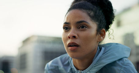 Image showing Sweat, fitness and face of woman in city for rest, break and breathe after running, workout and exercise. Sports, endurance and person in town with intense training for wellness, health and challenge