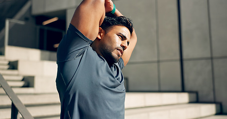 Image showing Man, athlete or stretching arms at stairs for exercise, workout or wellness outdoor by building. Urban fitness, person or warm up for power and performance with strength, training and health by steps