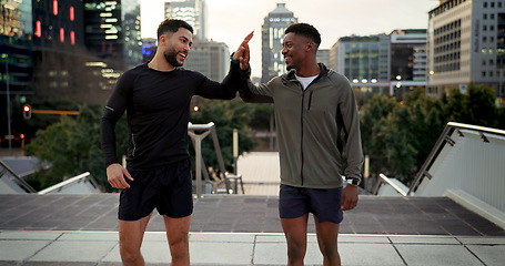 Image showing Friends, men and runner with high five outdoor for fitness, exercise or city training during workout. Athlete, people and hands together for team building, happiness and support for running challenge