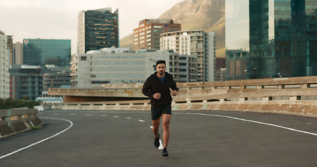 Image showing Athlete, morning and running in city street, road and bridge for fitness, workout and marathon training. Man, person or exercise in South Africa for cardio wellness, health or triathlon performance