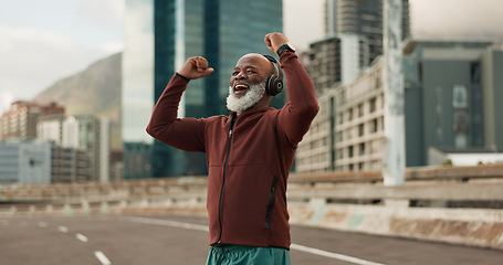 Image showing Exercise, celebration and senior man, headphones, city and achievement with workout, streaming music and radio. African person, pensioner and runner with headset, progress and fitness wellness or joy