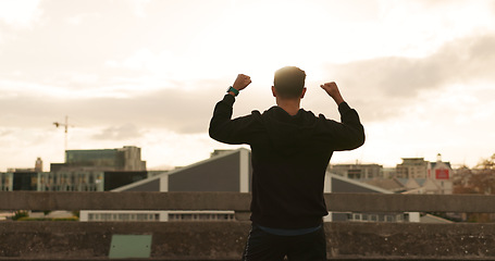 Image showing Man, runner or cheers in city for exercise time, fitness progress or training goal. Male person, athlete or victory or workout performance or cloudy morning in street, challenge or health celebration