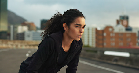 Image showing Woman, athlete or breathe outdoor for fitness, exercise or wellness and city background or nature. Runner, person or tired or break for workout, training and healthy body with sportswear in town road