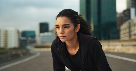 Image showing Woman, athlete and thinking outdoor for fitness, exercise or wellness with city background or nature. Runner, person or mindfulness for workout, training and healthy body with sportswear in town road