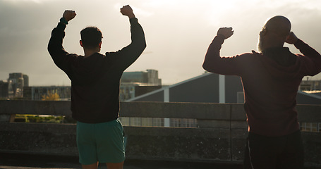 Image showing Man, winner and team fitness in city for workout, training or success in outdoor exercise together. Male person, athlete or friends in winning celebration, teamwork or achievement in an urban town