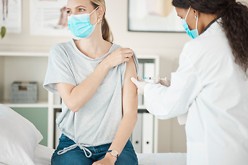 Image showing Covid vaccine at hospital, sick woman wearing face mask to prevent risk of virus and medical doctor giving injection during checkup at clinic. Female gp doing health test and protecting from disease