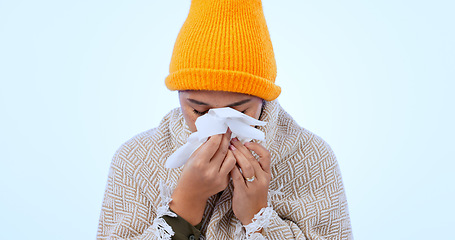 Image showing Sick, virus and woman with tissue in studio, background and mockup for flu, healthcare and blowing nose. Bacteria, sinus infection and person care for wellness, medical illness or hayfever allergies