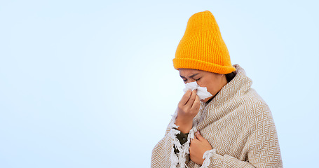 Image showing Sinusitis, virus and sick woman with tissue in studio, blue background or blowing nose with flu mockup. Bacteria, sinus infection or person care for wellness, illness or hayfever allergies healthcare